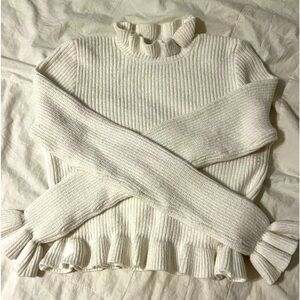 Forever 21, size medium, cropped frilly long sleeve sweater, white